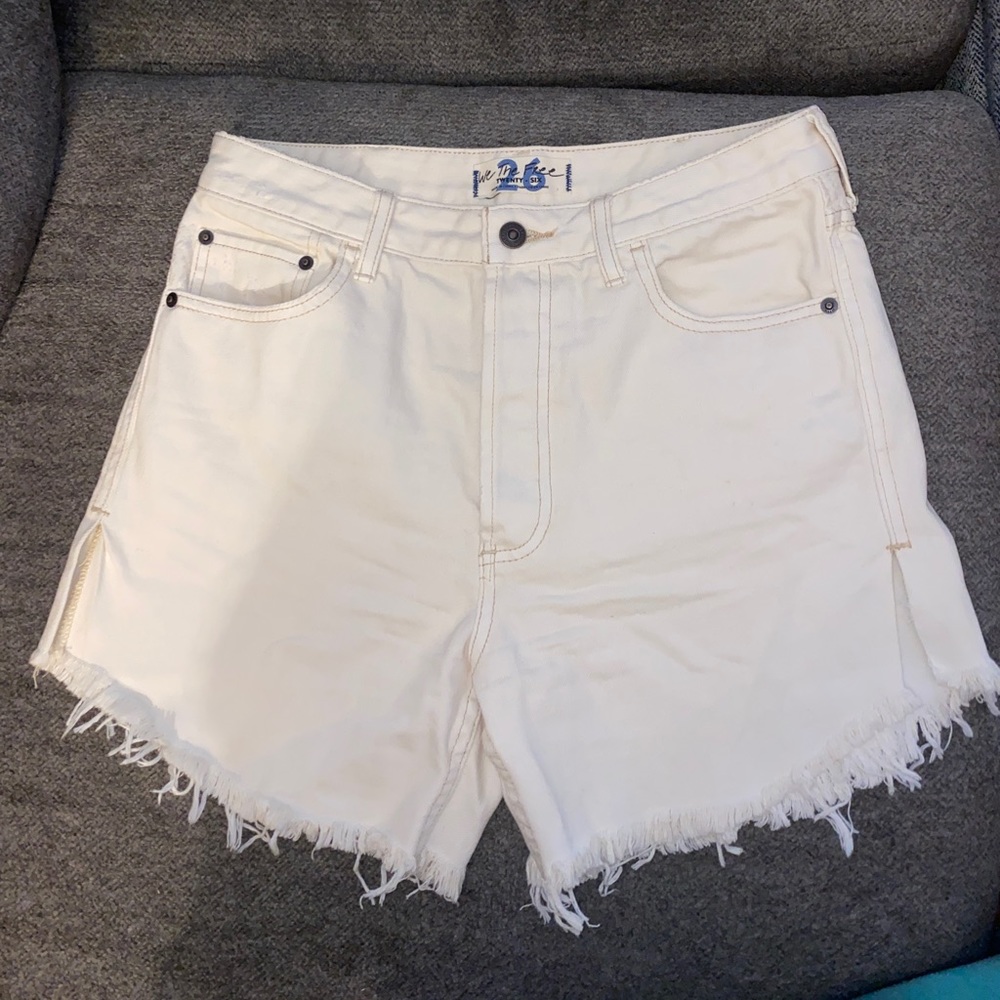 Free People We the Free off-white fringe shorts with button fly & split sides